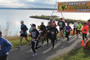 Haunted Hustle Event Start. The race starts in Haileybury, passes in front of the Presidents' Suites and heads towards New Liskeard. / Le départ de la course Haunted Hustle organisée par le groupe Stato. 