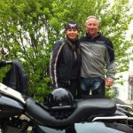 Motorcycle couple during their stay at the Presidents' Suites. in Haileybury. / Un couple en moto pendant leur séjour aux Suites des Présidents.