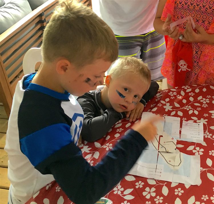 Groups with children - Assembling the treasure map, part of the pirate treasure hunt on Farr Island