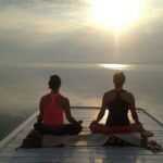 Vacation getaway morning meditation on dock at the Presidents' Suites and enjoying the sunrise on lake Temiskaming. / Méditation du matin sur le quai aux Suites des Présidents en profitant du levée de soleil sur le lac Témiskaming.