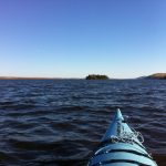 Kayaking to Farr Island on Lake Temiskaming.Our guests can use both our kayaks or canoes. / En route vers l'île Farr sur le lac Témiskaming. Nos clients peuvent utiliser nos kayaks ou canots.