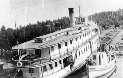 The Meteor steam ship being brought into the Moore's Cove Shipyard. The Meteor is the most famous vessel to have travelled on Lake Temiskaming.