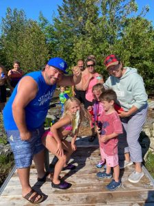 Family fishing while glamping on Farr Island