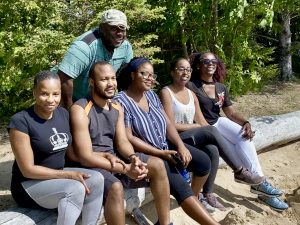 Multi-cultural family glamping on Farr Island